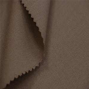 Tessuto uniforme da ufficio in gabardine di lana 100%.